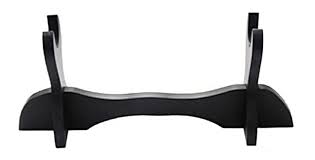 Supporto per spada katana da appoggio in legno nero.