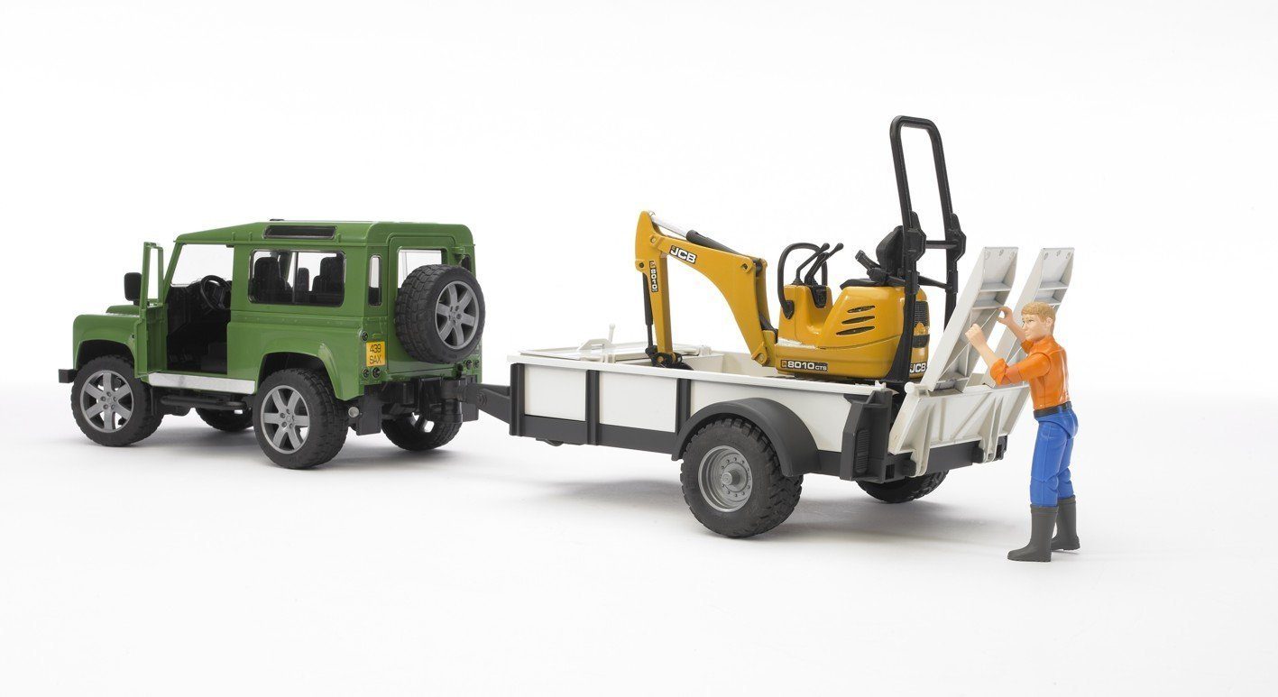 Land Rover Defender c/rim.trasp. JCB Micro escavatore con figura - toysvaldichiana.it