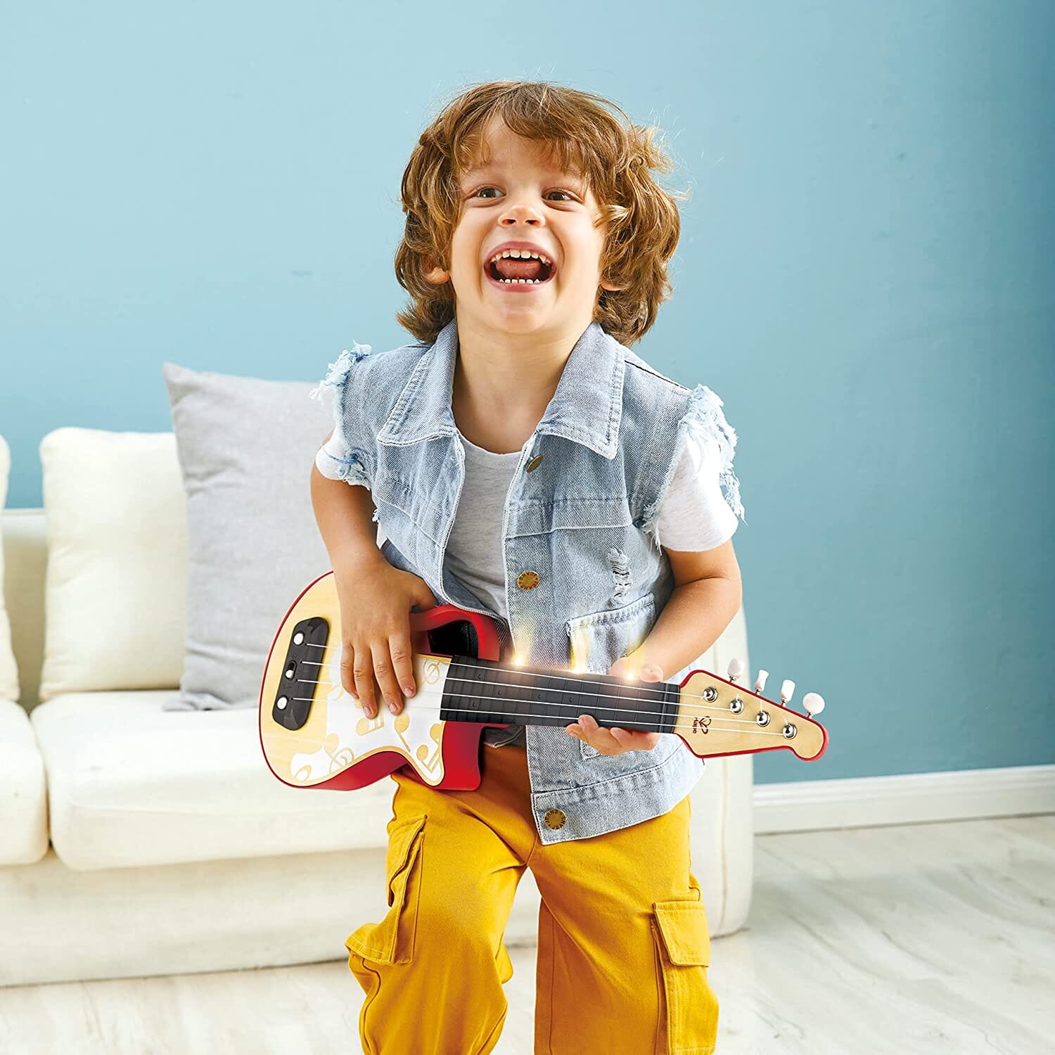 Ukulele Rosso A Ritmo Di Luci Hape toysvaldichiana.it 