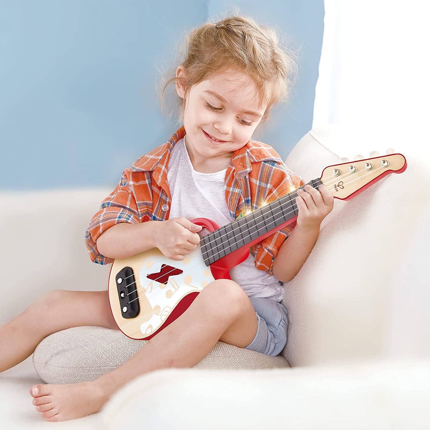 Ukulele Rosso A Ritmo Di Luci Hape toysvaldichiana.it 